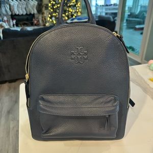 Tory burch navy leather backpack.